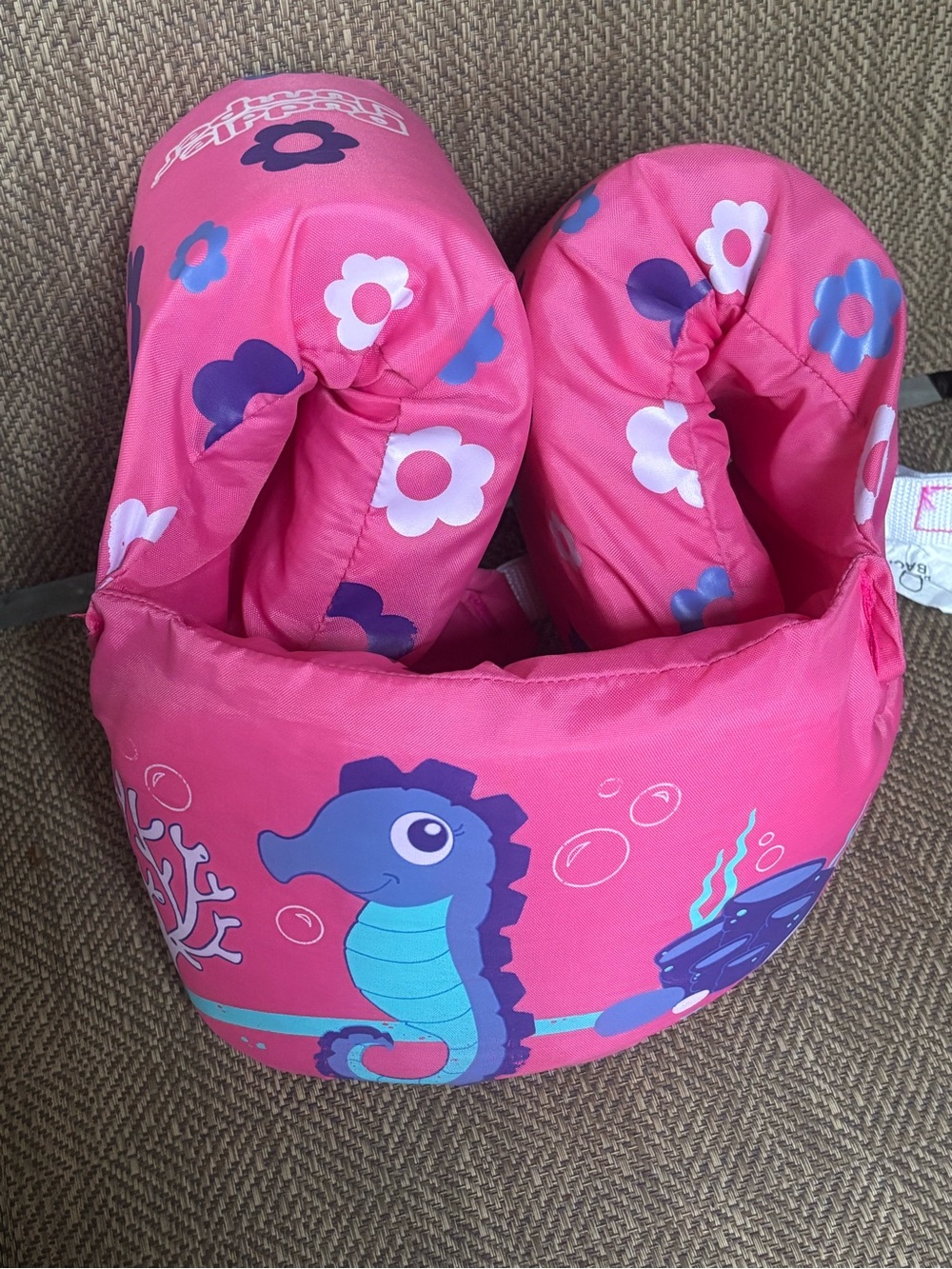 Stearns Puddle Jumper child life jacket For a child in the 30–50 lb range.